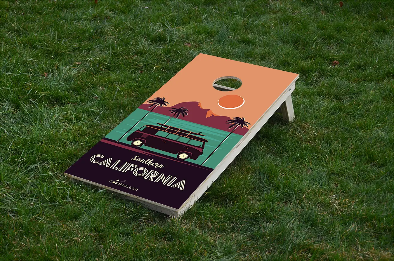 cornhole surfeur dans un tube, sur le gazon, vue de face