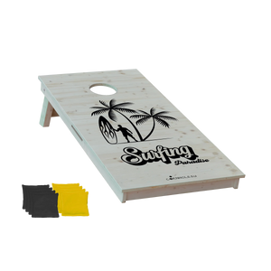 cornhole surfeur avec sa planche sous les palmiers, vue de face