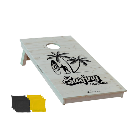 cornhole surfeur avec sa planche sous les palmiers, vue de face